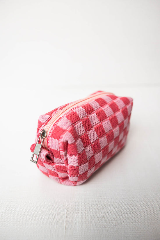 pink checkered cosmetic bag