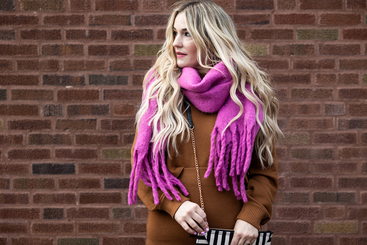 colder weather knit fringe scarf in fuchsia